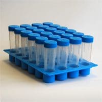 A blue test tube rack holding multiple test tubes with blue caps.