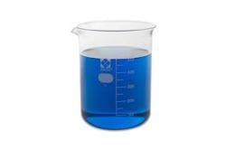 A beaker filled with blue liquid on a white background.