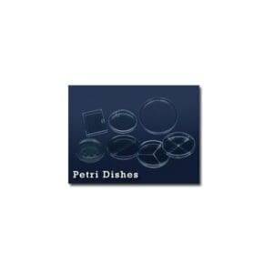 Set of black petri dishes on a dark surface.